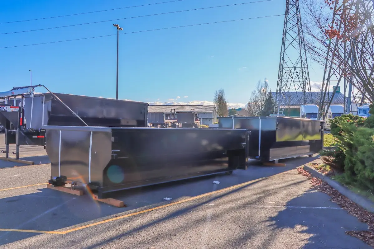 Roll-off dumpster ready for waste disposal at job site for 12 Yard Dumpster Rental in Red Wing